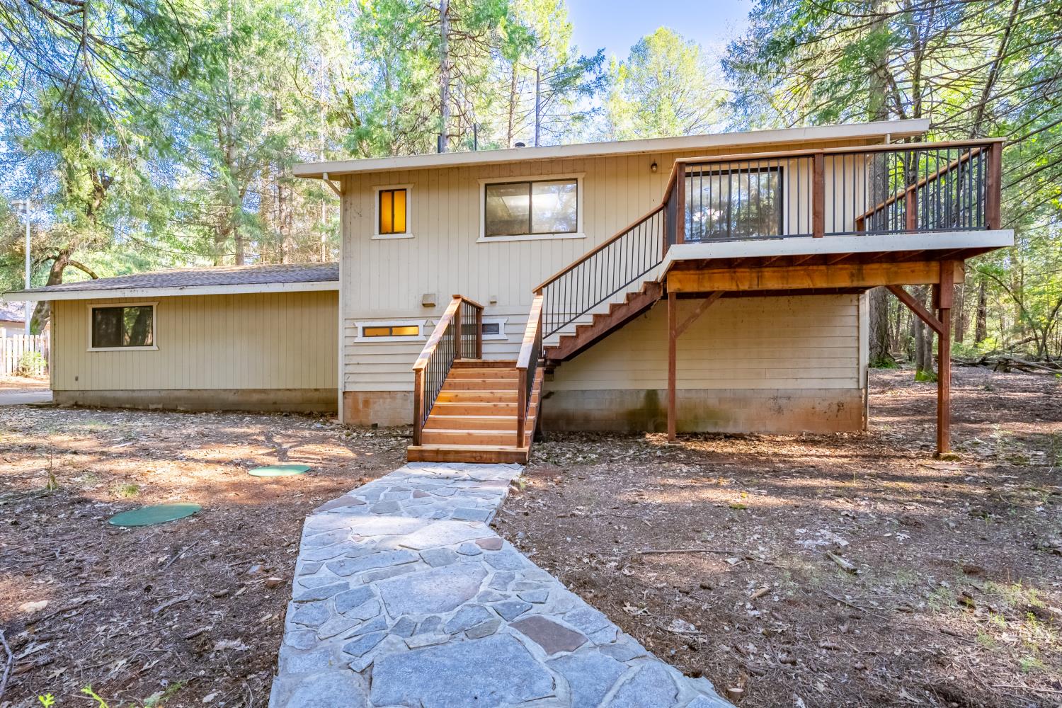 22945 Foresthill Road Foresthill, CA 95631 - Photo 45 of 63 a view of a house with a yard