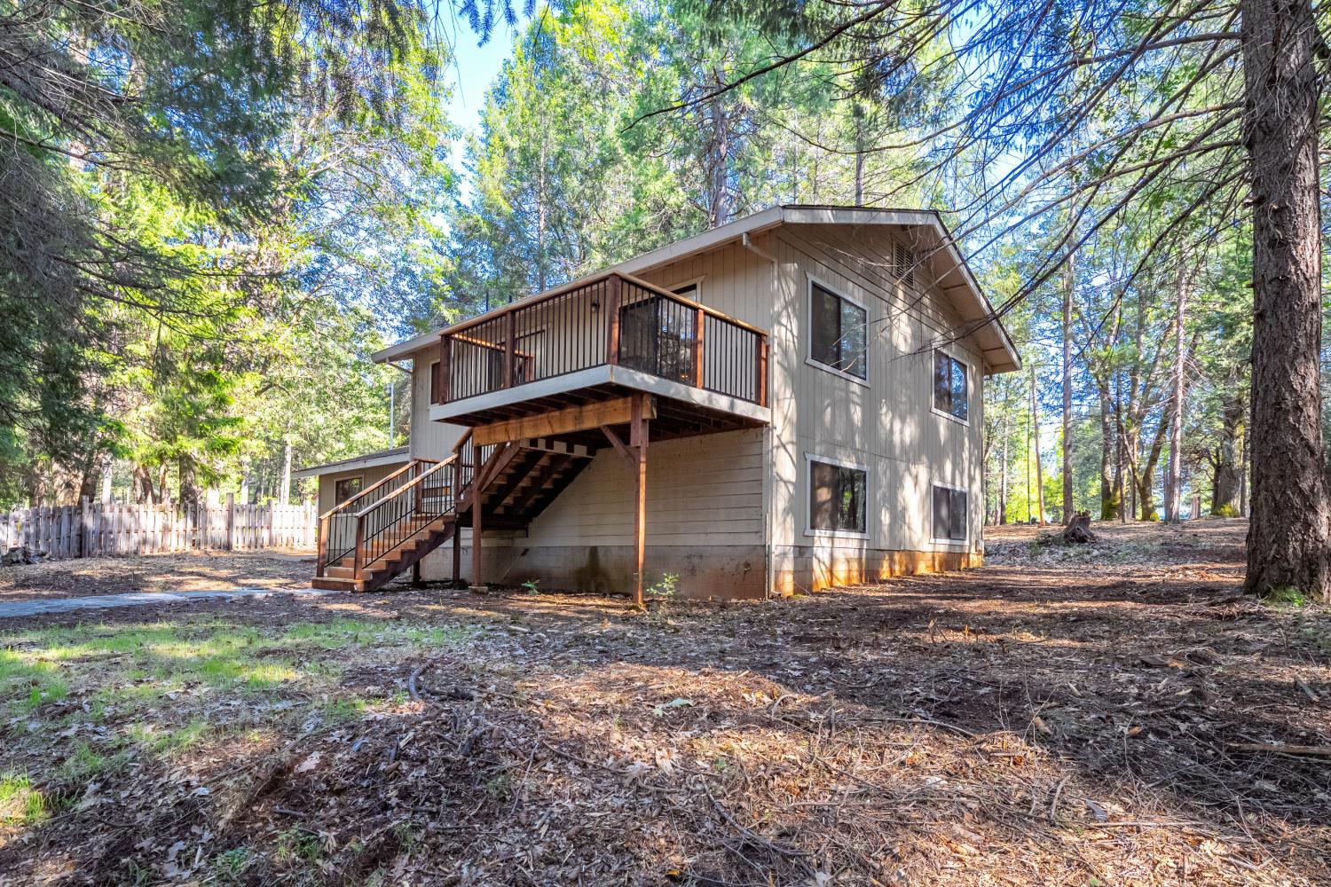 22945 Foresthill Road Foresthill, CA 95631 - Photo 47 of 63 a view of a house with a yard