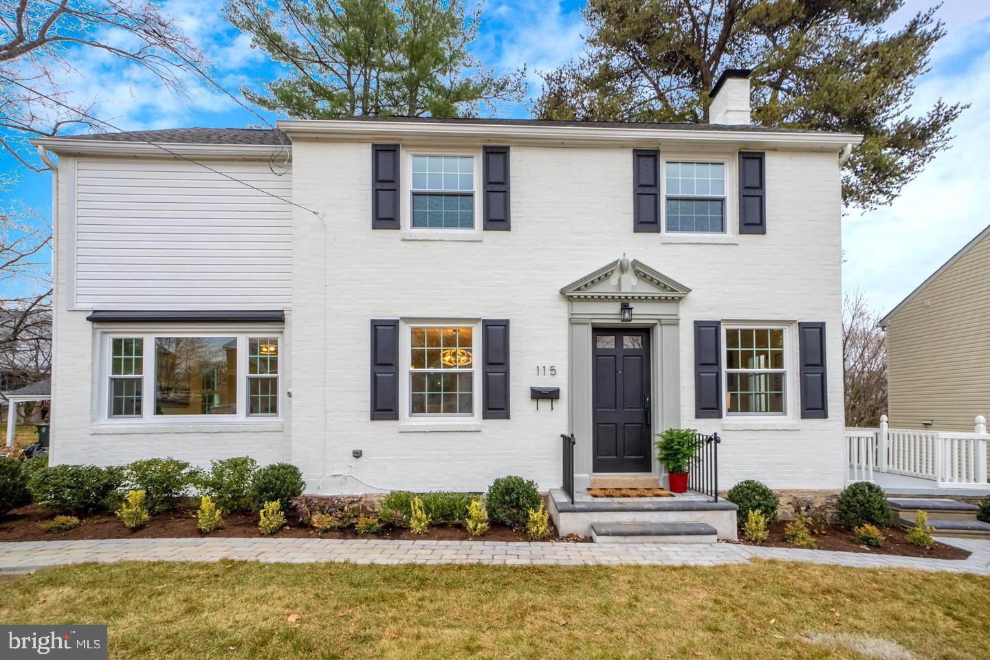 a front view of a house with outdoor space