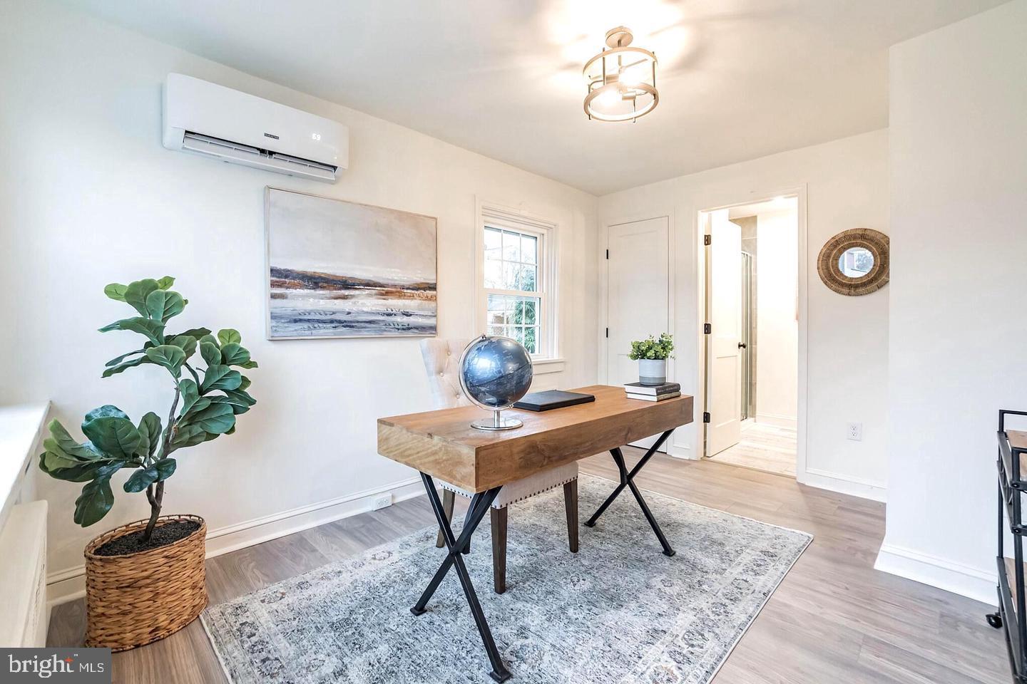 115 Beech Road Wallingford, PA 19086 - Photo 14 of 29 a workspace with furniture and a potted plant