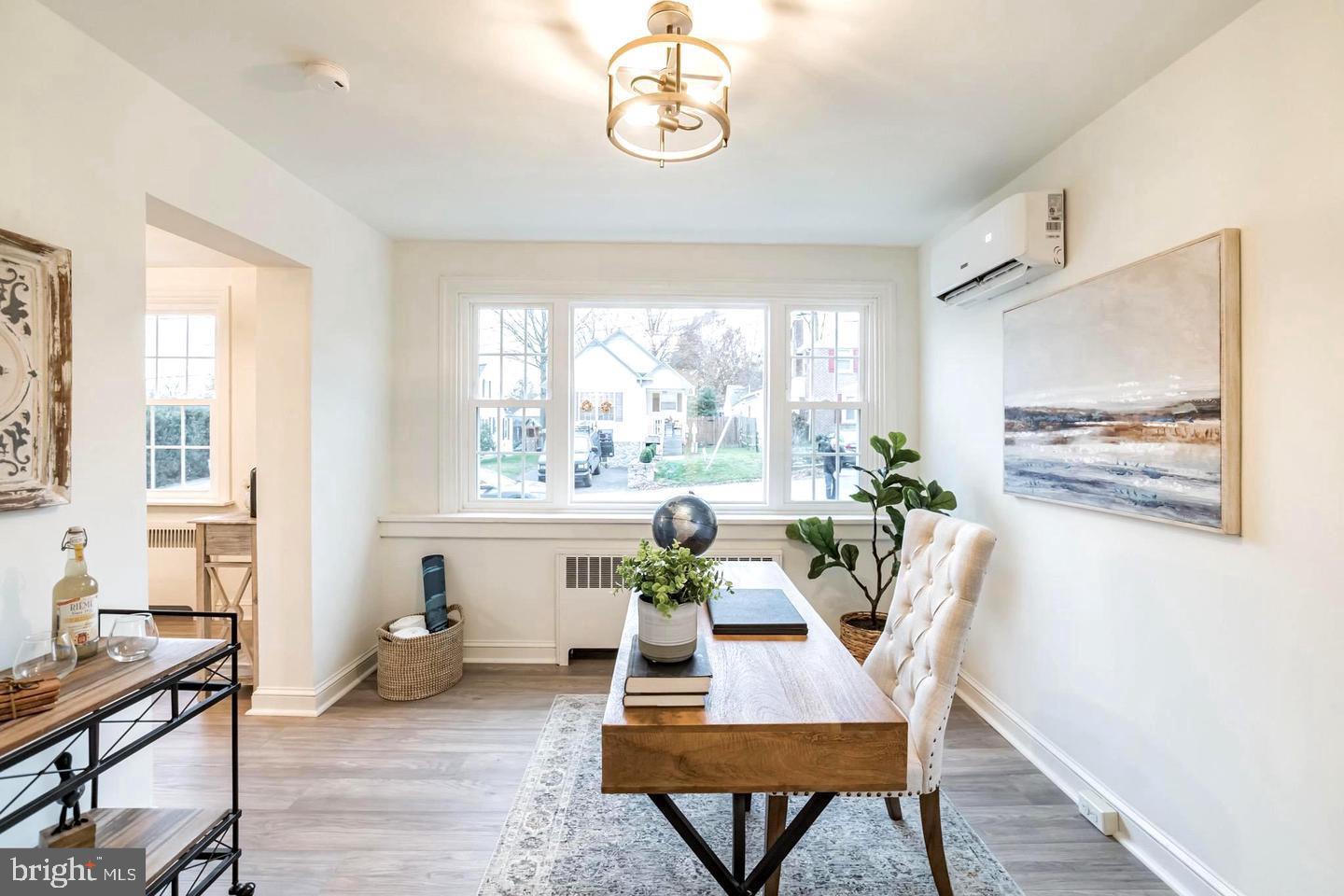115 Beech Road Wallingford, PA 19086 - Photo 16 of 29 a workspace with furniture window and wooden floor