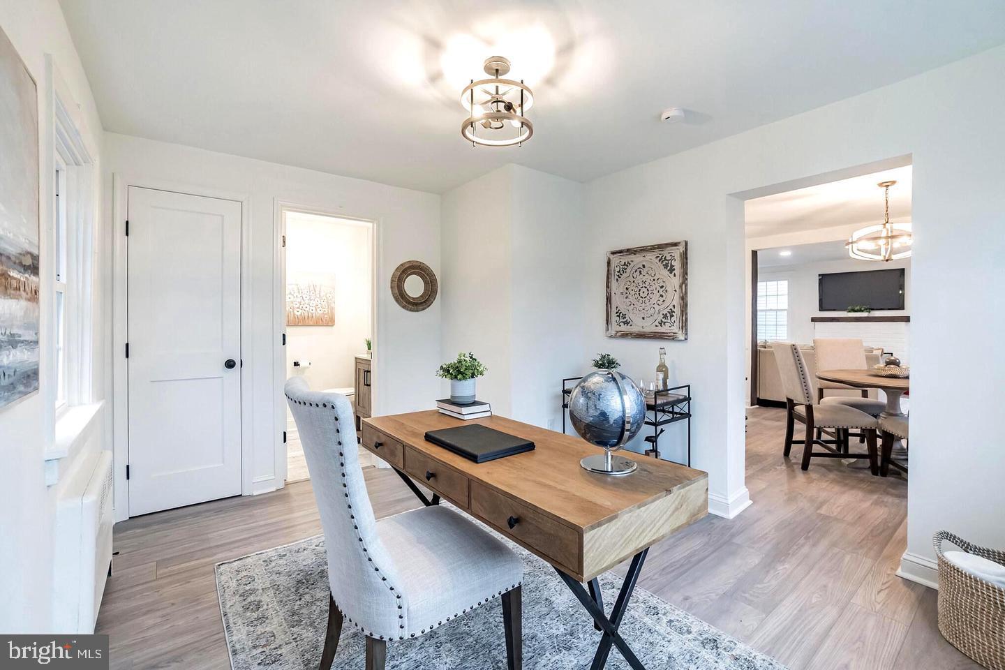 115 Beech Road Wallingford, PA 19086 - Photo 17 of 29 a view of a dining room with furniture and wooden floor
