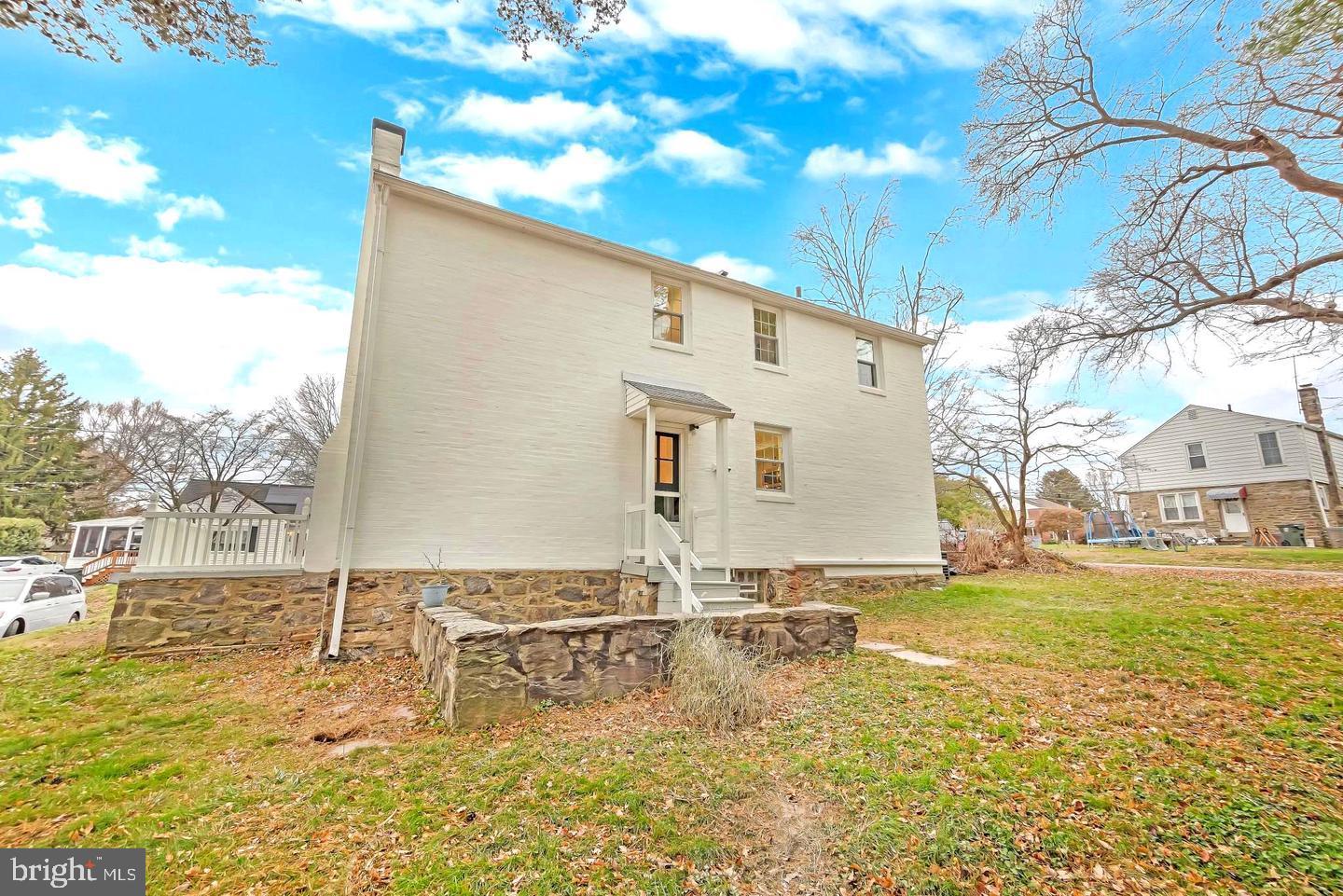 115 Beech Road Wallingford, PA 19086 - Photo 29 of 29 a view of pool house with yard and lake view