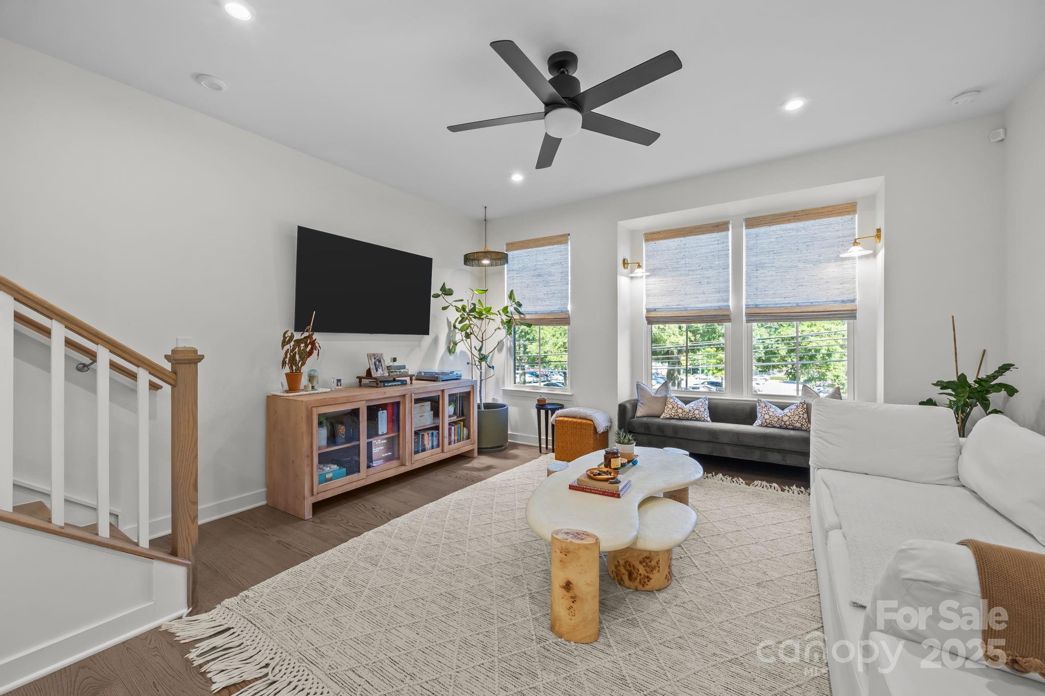 544 Billingsley Road Charlotte, NC 28211 - Photo 13 of 24 a living room with furniture and a flat screen tv