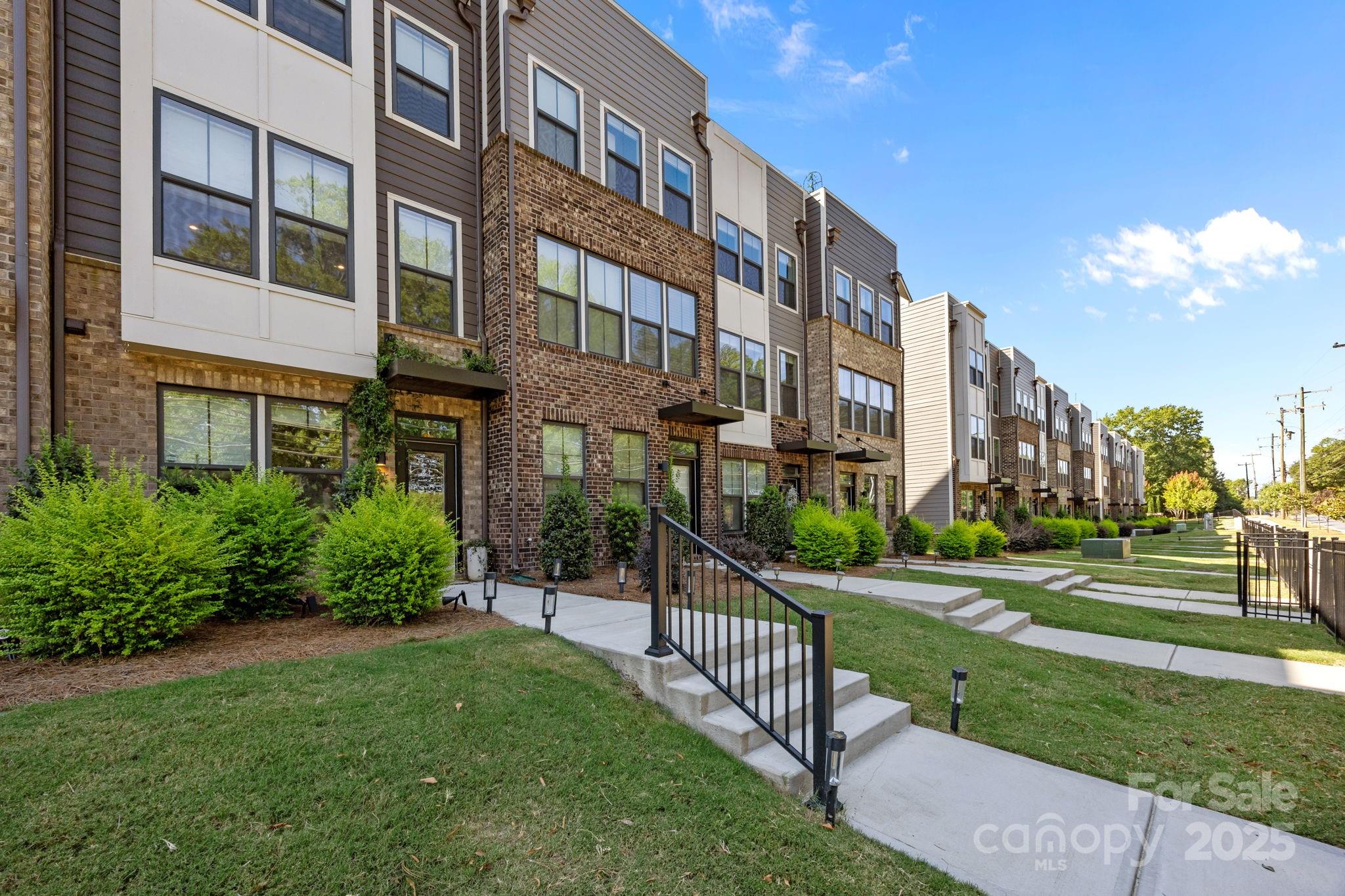 544 Billingsley Road Charlotte, NC 28211 - Photo 2 of 24 a view of a building with a yard