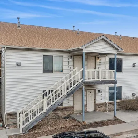 a front view of a house with a porch