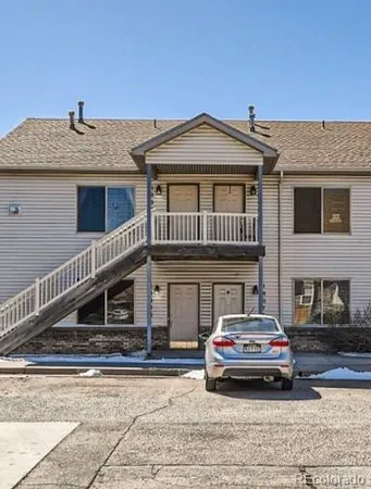 a car parked in front of a house