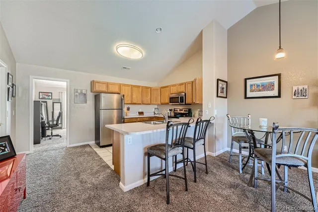 a view of a dining room with furniture