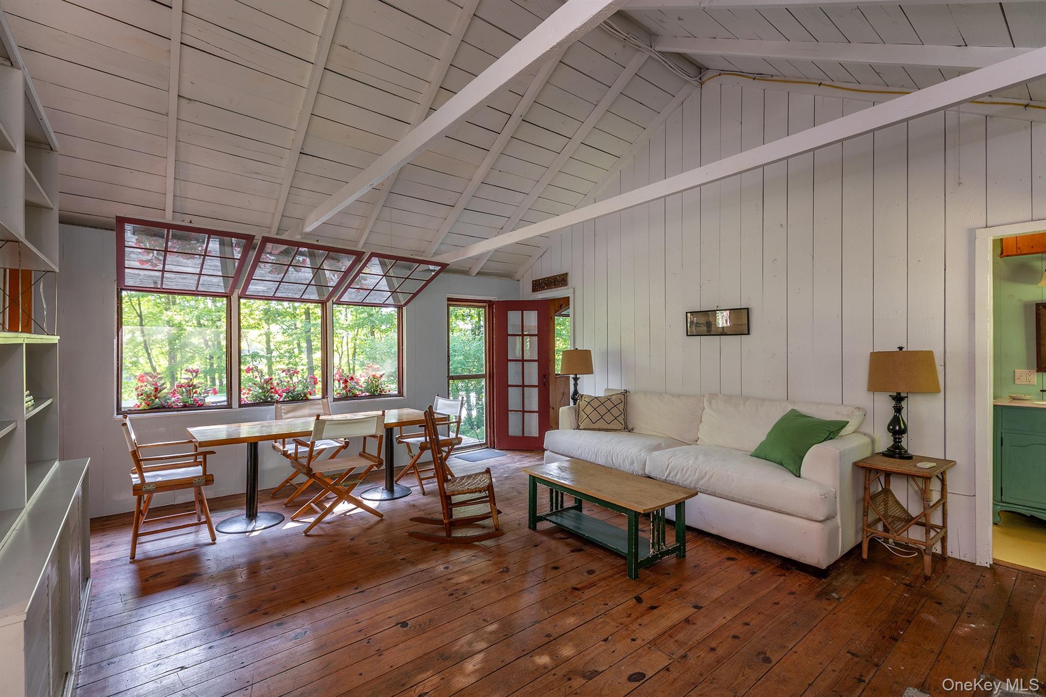 Undisclosed Address Brewster, NY 10509 - Photo 11 of 39 a living room with furniture and wooden floor