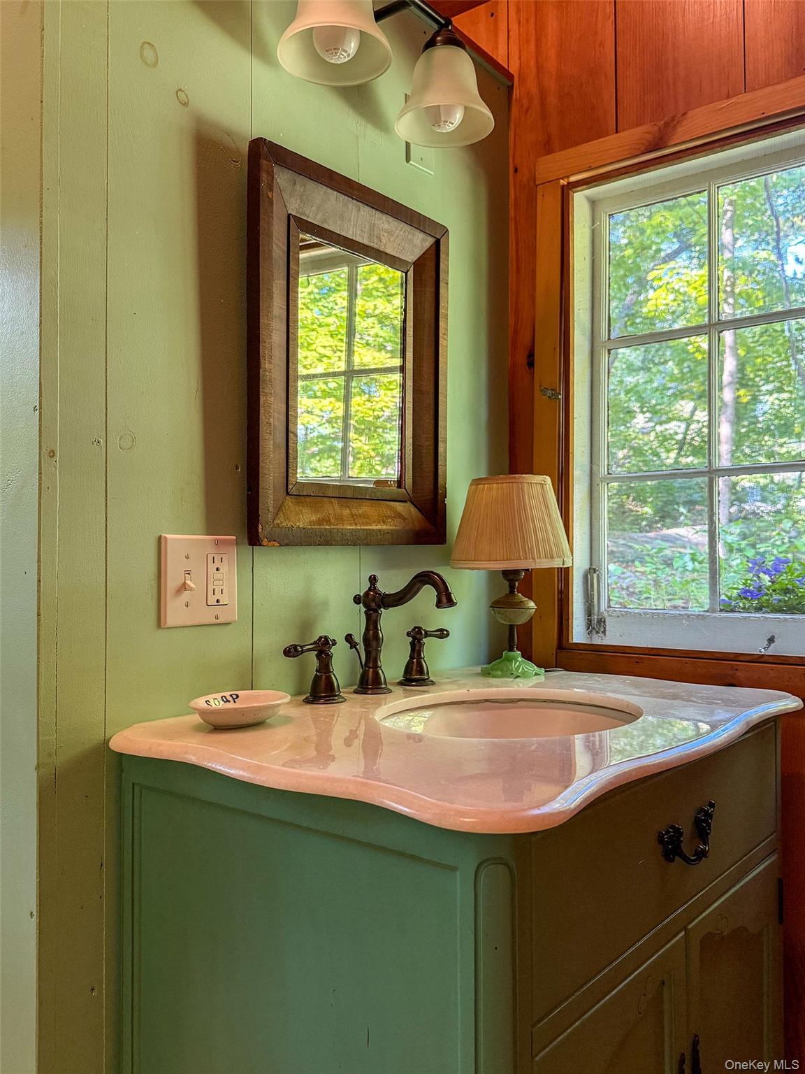 Undisclosed Address Brewster, NY 10509 - Photo 17 of 39 a bathroom with a sink and a window