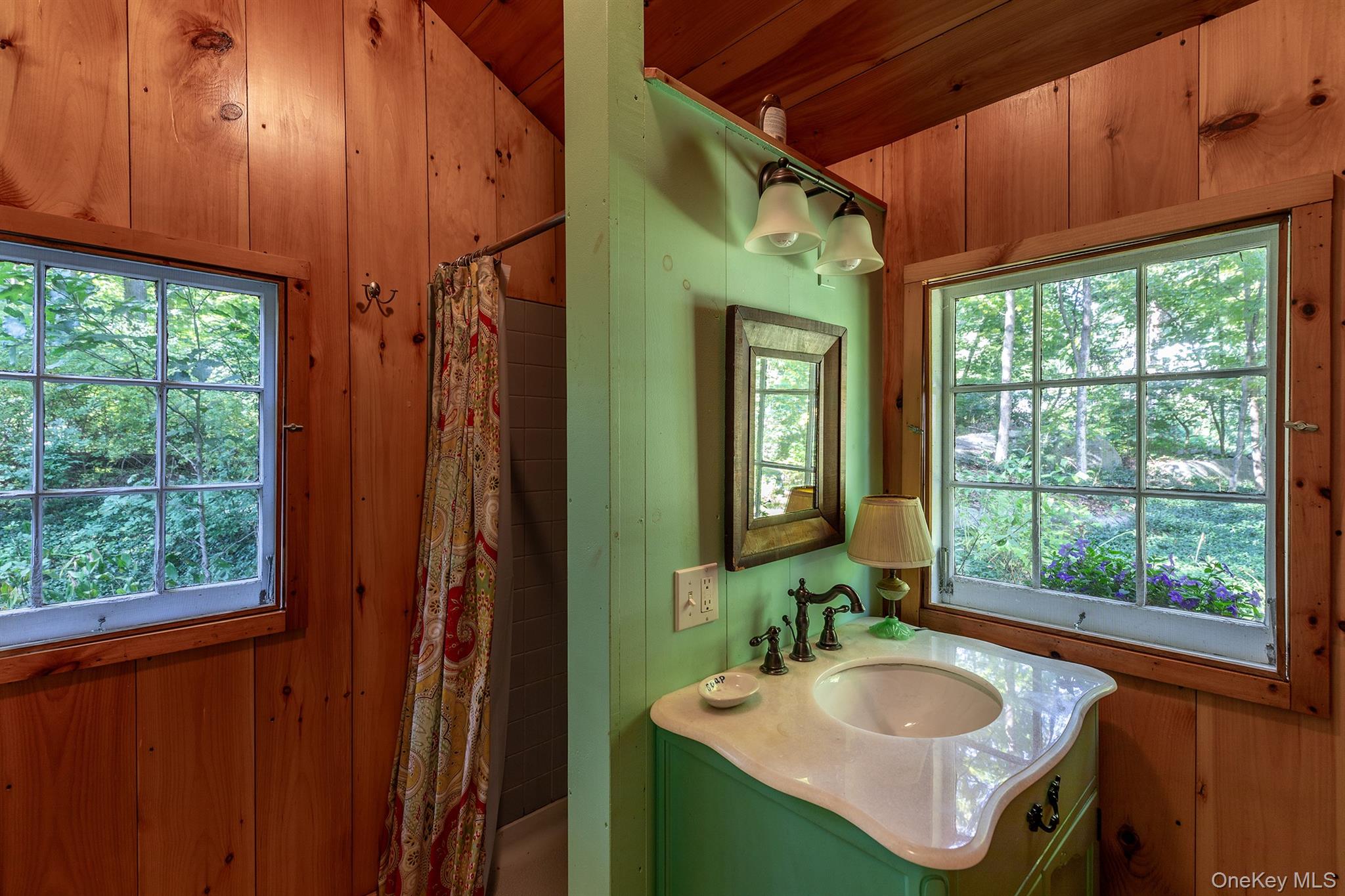 Undisclosed Address Brewster, NY 10509 - Photo 19 of 39 a bathroom with a granite countertop sink and a mirror