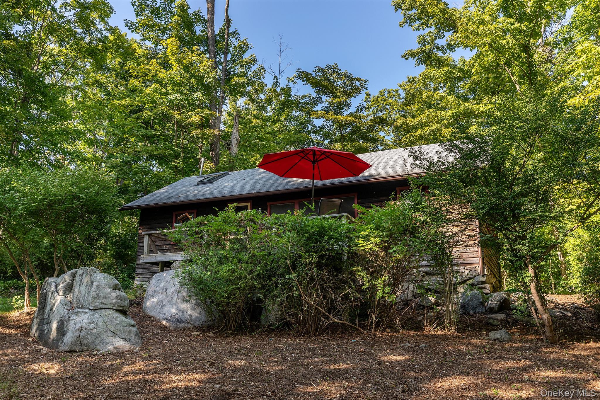 Undisclosed Address Brewster, NY 10509 - Photo 30 of 39 a view of a outdoor space with a patio