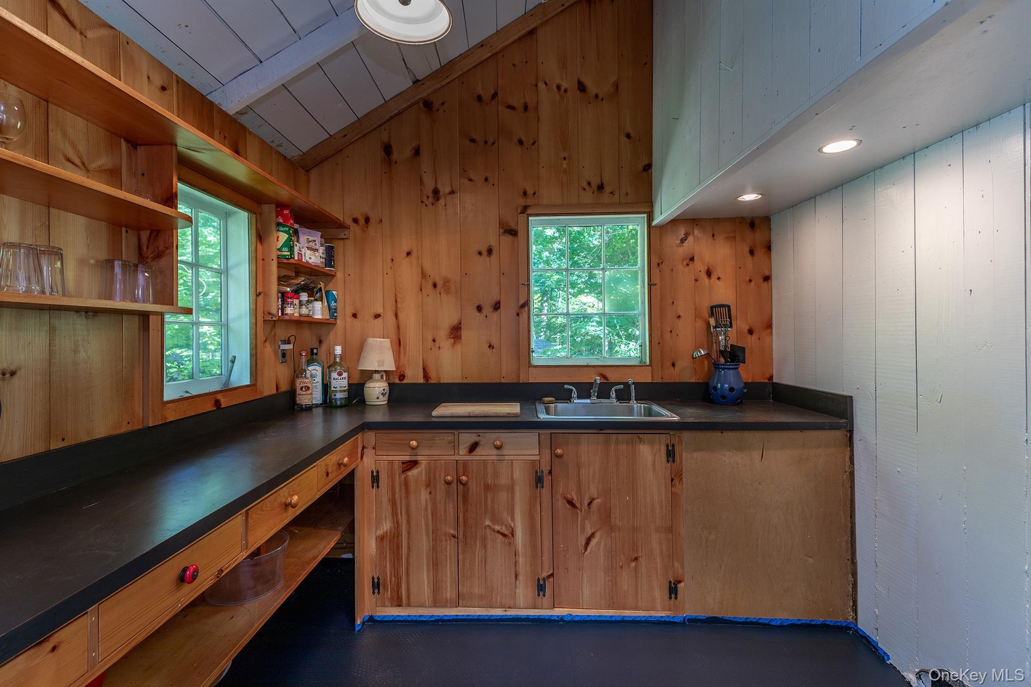 Undisclosed Address Brewster, NY 10509 - Photo 5 of 39 a room with wooden floor and window