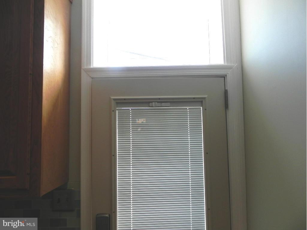 1315 Webster Street Baltimore, MD 21230 - Photo 10 of 29 Transome Window Over Door