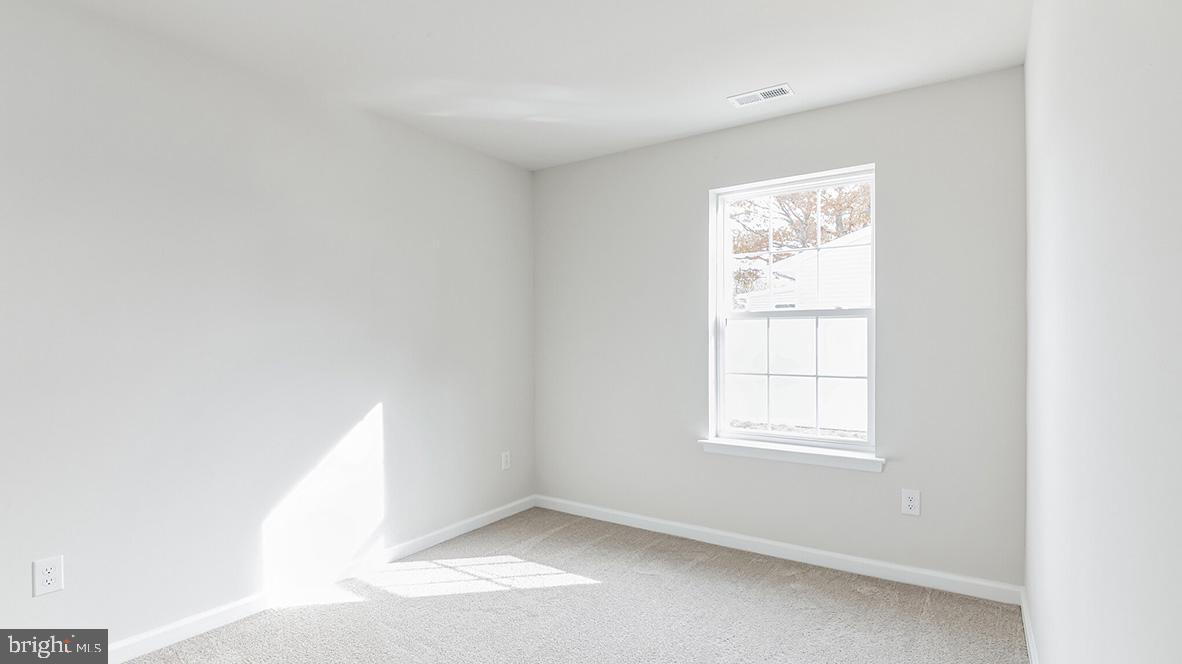 317 Vero Road Egg Harbor Township, NJ 08234 - Photo 12 of 14 a view of an empty room with a window