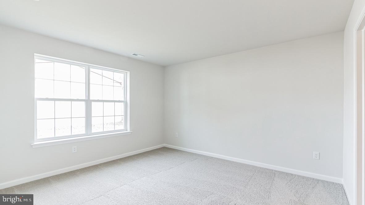 317 Vero Road Egg Harbor Township, NJ 08234 - Photo 10 of 14 an empty room with a window