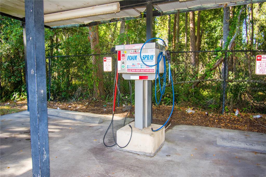 13830 Orange Sunset Drive, Unit 202 Tampa, FL 33618 - Photo 33 of 34 a sign that is on the side of the road