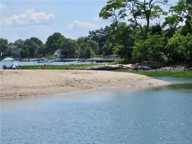 a view of a swimming pool and a yard
