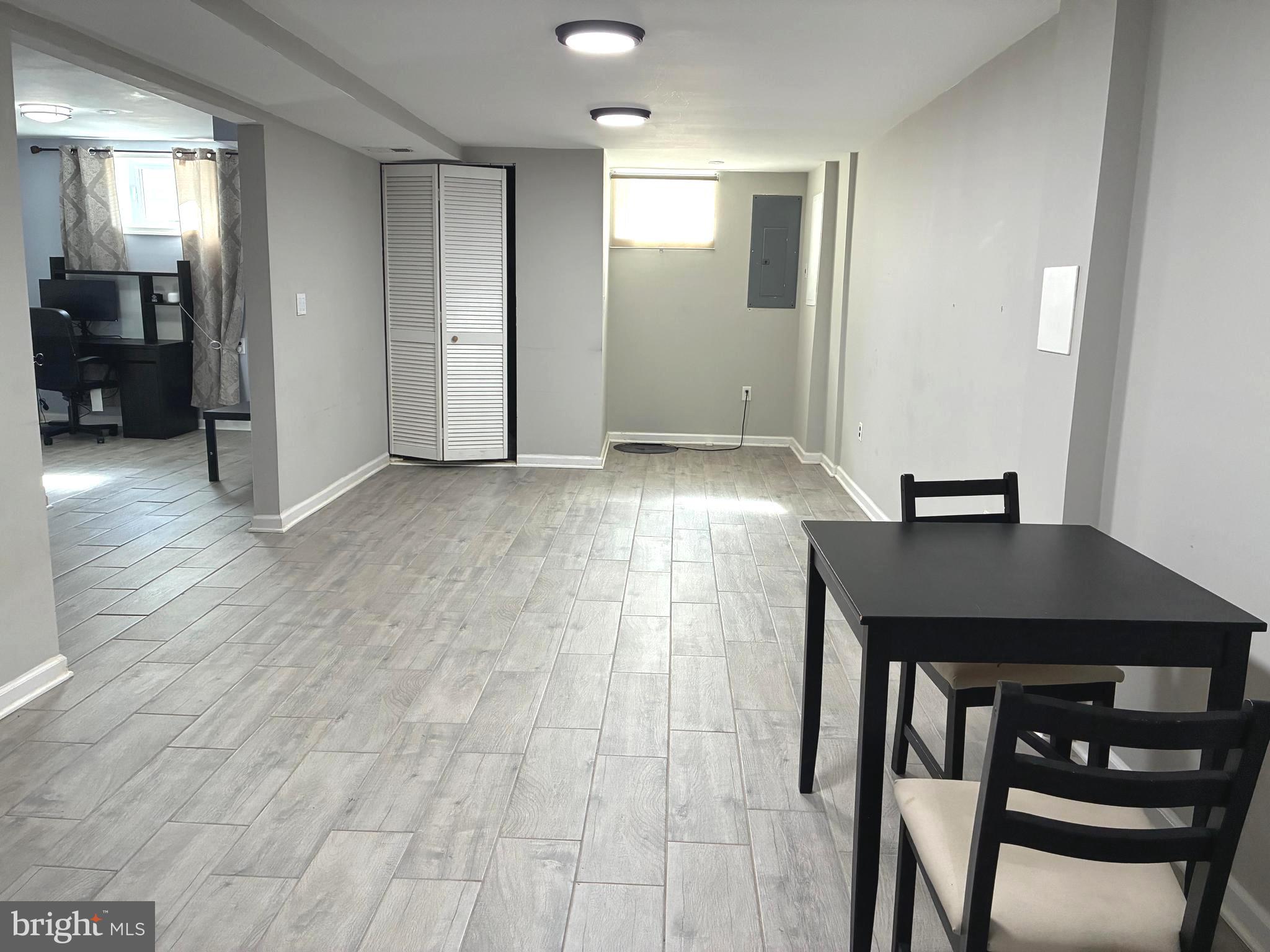 5112 Hollywood Road College Park, MD 20740 - Photo 25 of 28 Lower Level Living/Dining Area