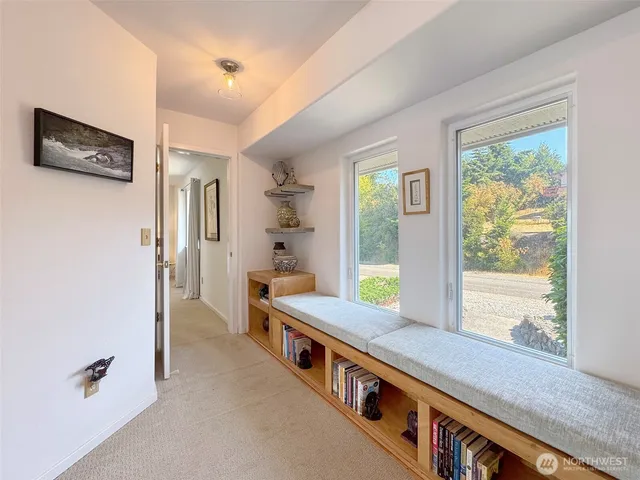 a view of an empty room and window