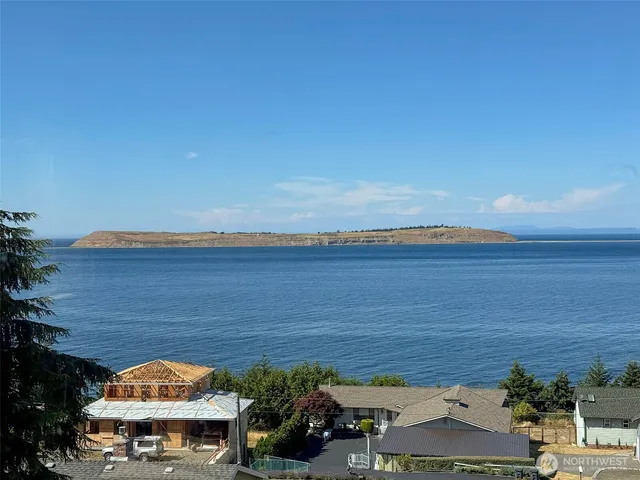 an aerial view of a house with a garden