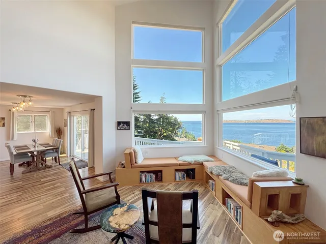 a view of a dining room with furniture window and outside view