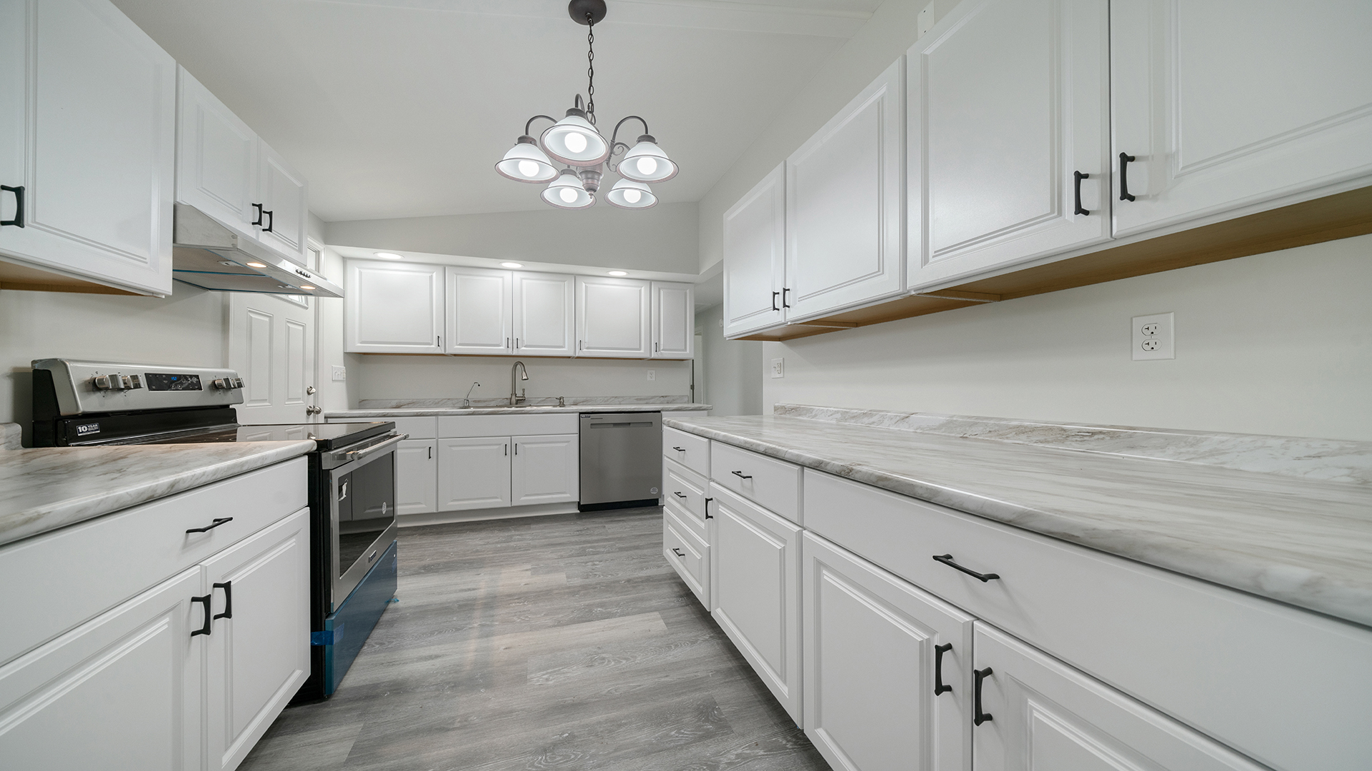 22005 Harmony Road Marengo, IL 60152 - Photo 15 of 49 a kitchen with cabinets a sink and appliances