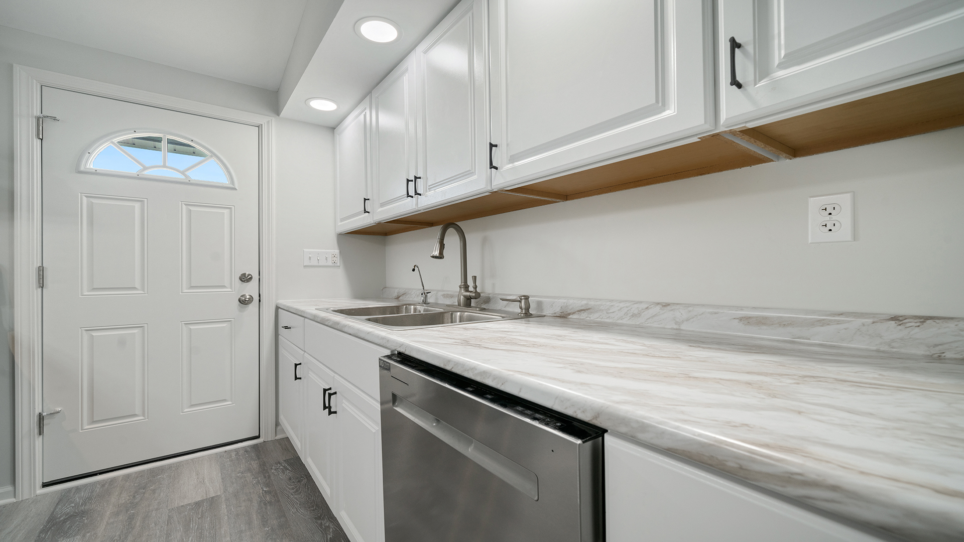 22005 Harmony Road Marengo, IL 60152 - Photo 17 of 49 a kitchen with a sink and cabinets