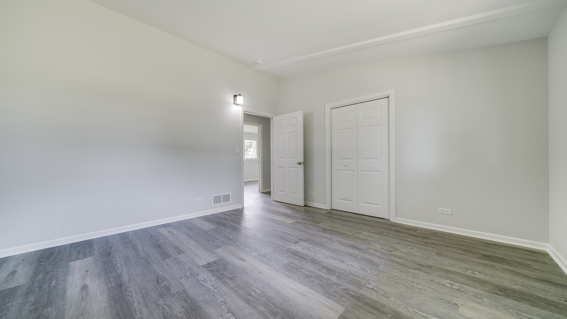 22005 Harmony Road Marengo, IL 60152 - Photo 20 of 49 a view of an empty room with wooden floor