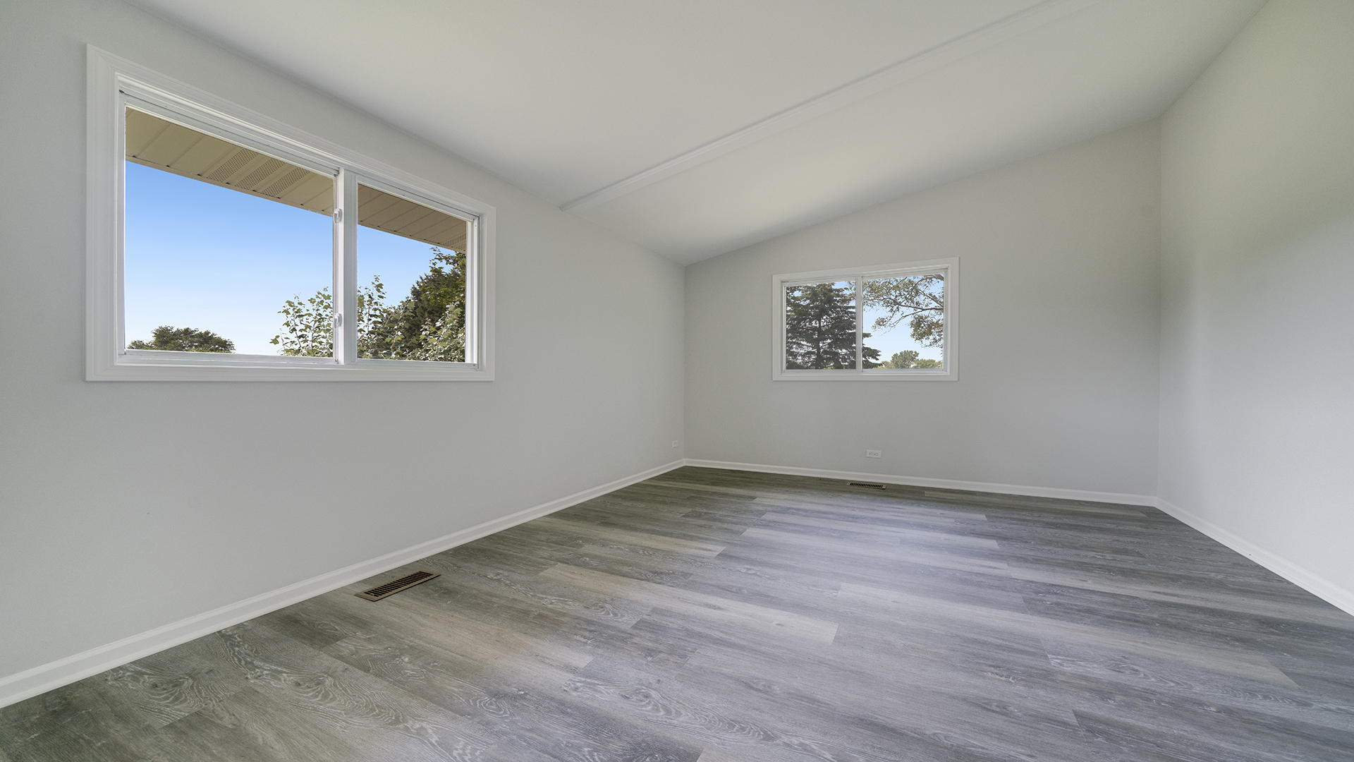 22005 Harmony Road Marengo, IL 60152 - Photo 21 of 49 an empty room with wooden floor and window