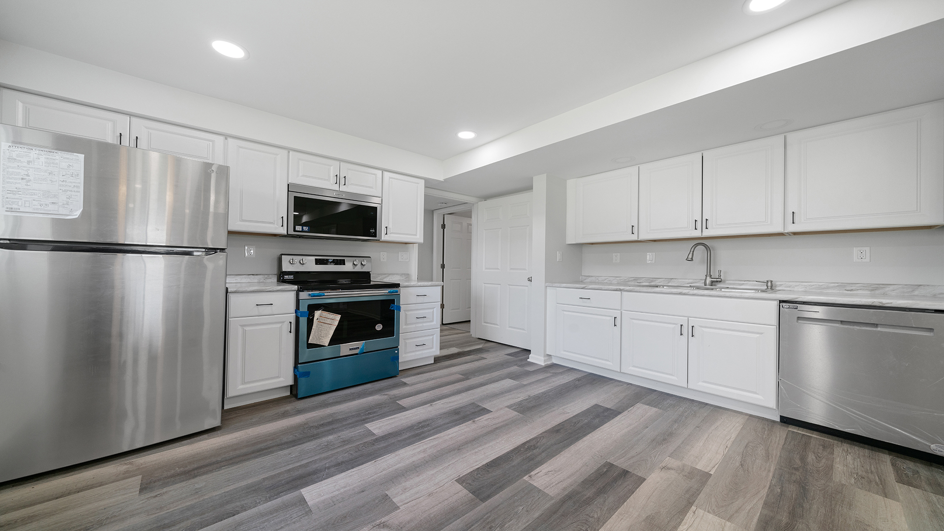 22005 Harmony Road Marengo, IL 60152 - Photo 26 of 49 a kitchen with a refrigerator stove and microwave