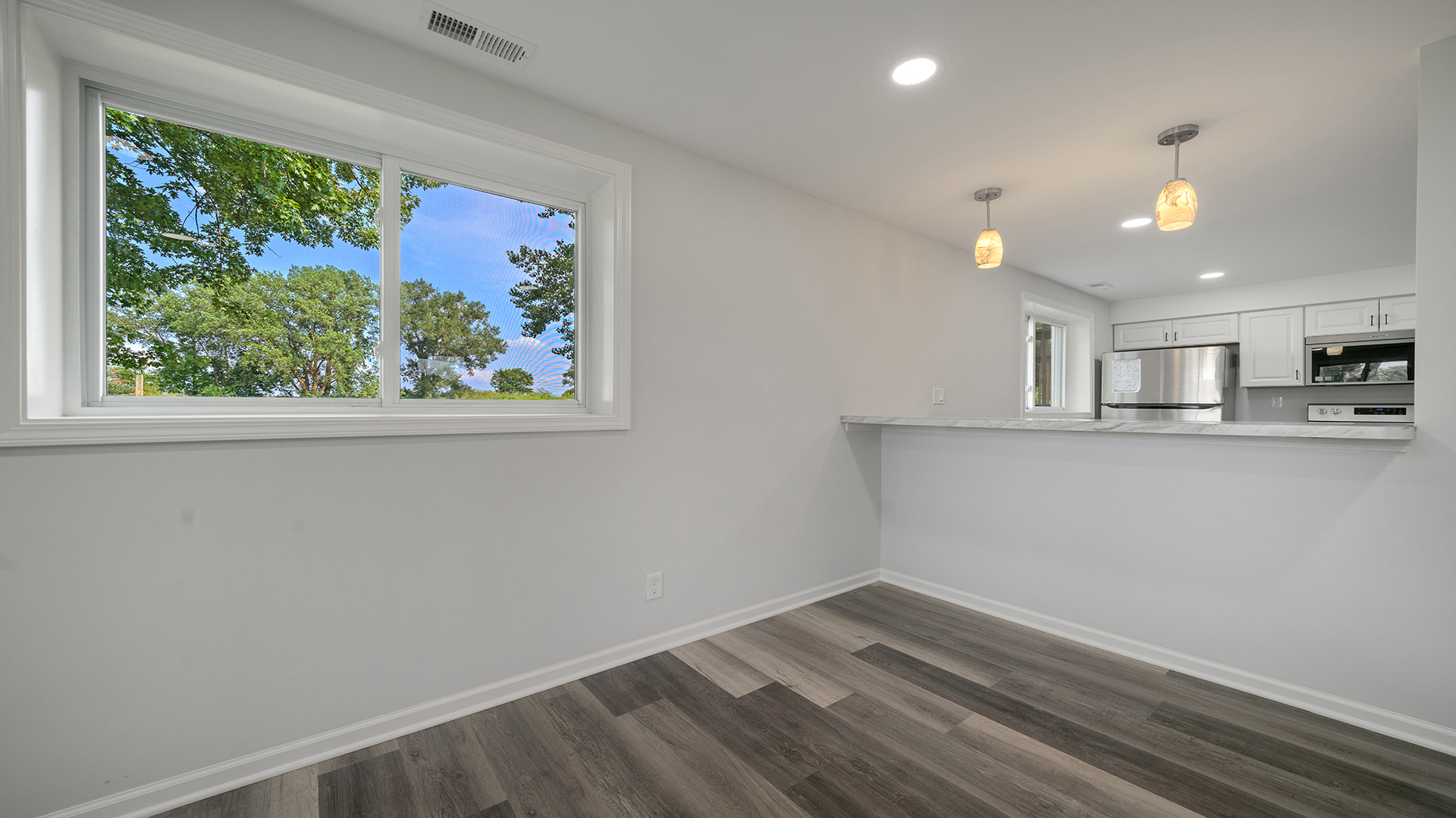 22005 Harmony Road Marengo, IL 60152 - Photo 28 of 49 a view of kitchen with wooden floor and window