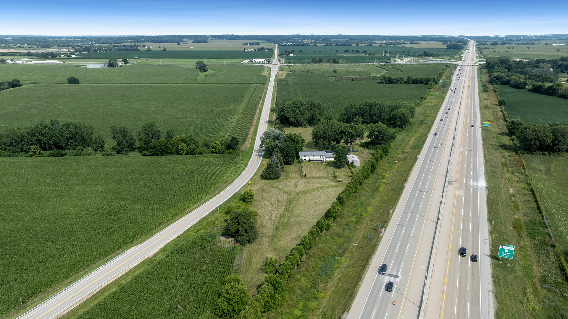 22005 Harmony Road Marengo, IL 60152 - Photo 5 of 49 a view of a lake with a big yard