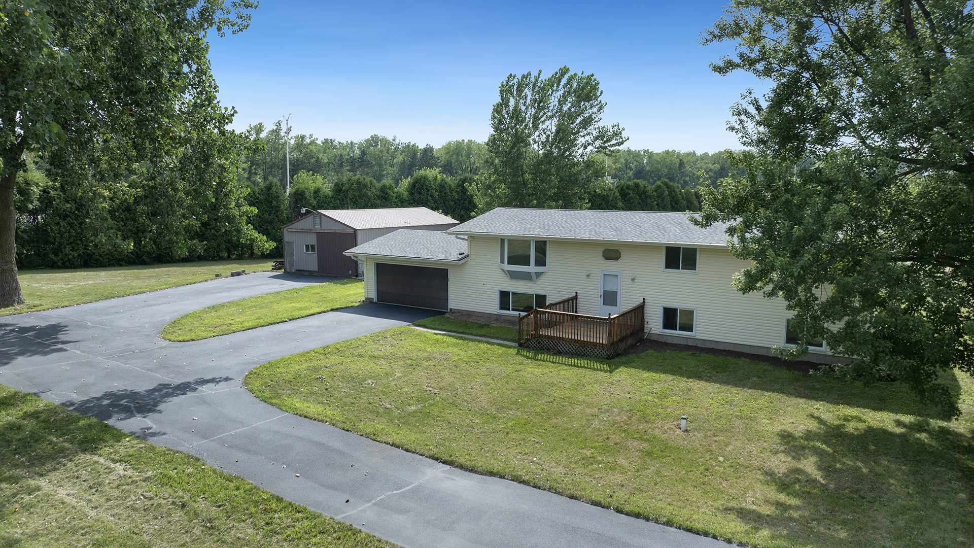 22005 Harmony Road Marengo, IL 60152 - Photo 7 of 49 a view of a swimming pool and lounge chairs