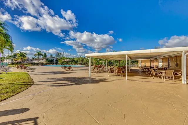 a view of a building with mountains
