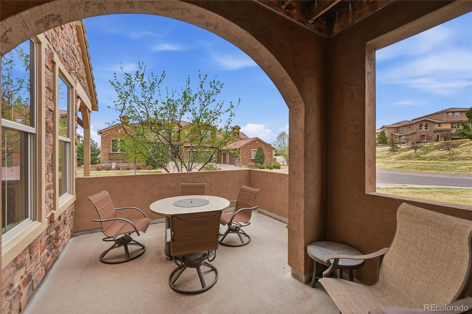 9500 Pendio Court Highlands Ranch, CO 80126 - Photo 7 of 15 a bathroom with a granite countertop sink and a mirror