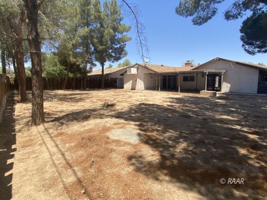 617 West Wasp Avenue Ridgecrest, CA 93555 - Photo 29 of 34 a front view of a house with a yard
