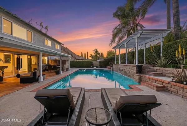 a view of yard with patio