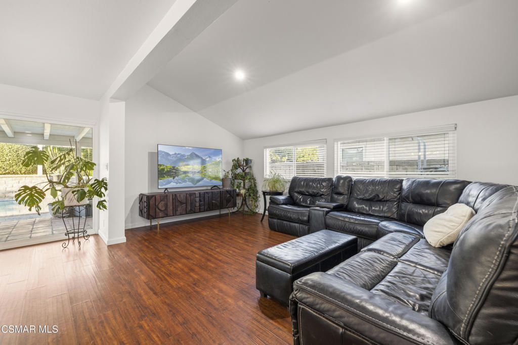 2371 Larch Street Simi Valley, CA 93065 - Photo 16 of 40 a living room with furniture and a flat screen tv