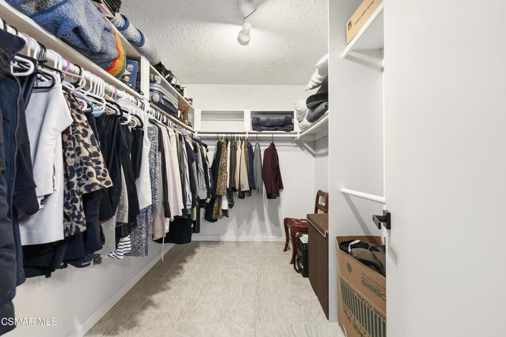 2371 Larch Street Simi Valley, CA 93065 - Photo 25 of 40 a view of walk in closet with clothes and shoes