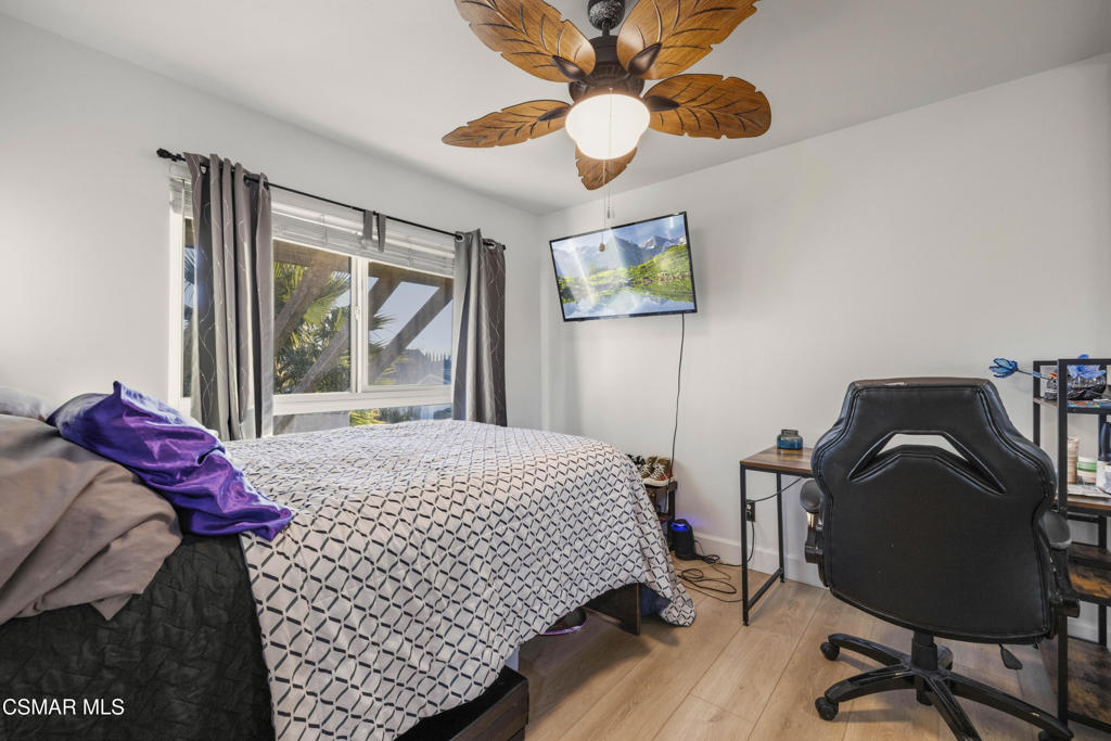 2371 Larch Street Simi Valley, CA 93065 - Photo 29 of 40 a bedroom with a bed and a desk