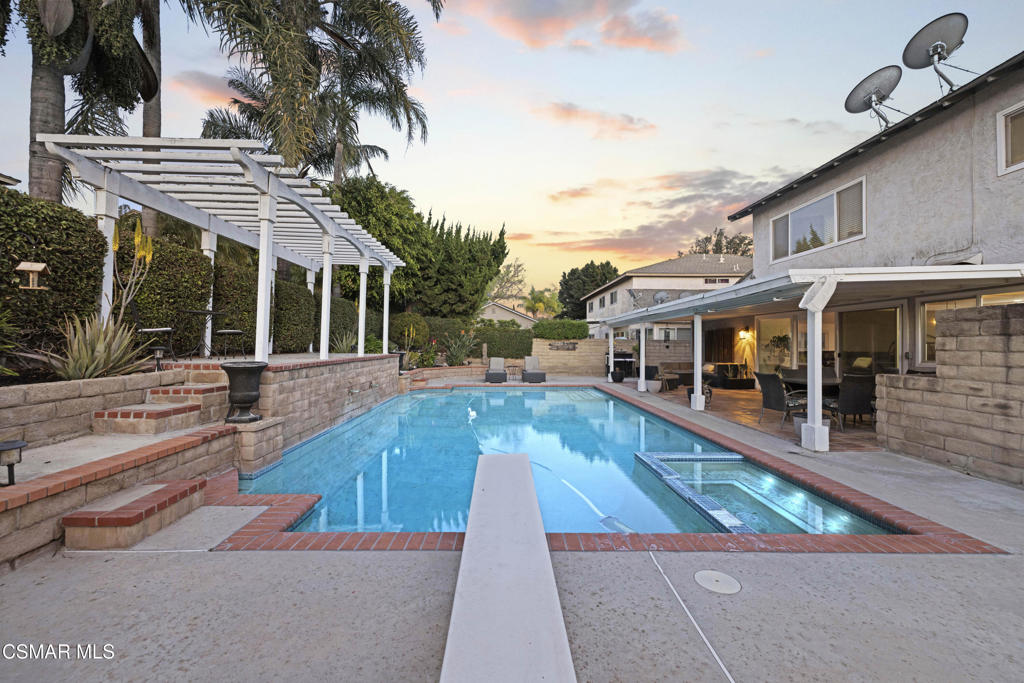 2371 Larch Street Simi Valley, CA 93065 - Photo 36 of 40 swimming pool view with a seating space and a garden view