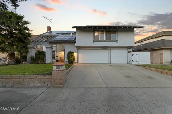 a house view with a outdoor space