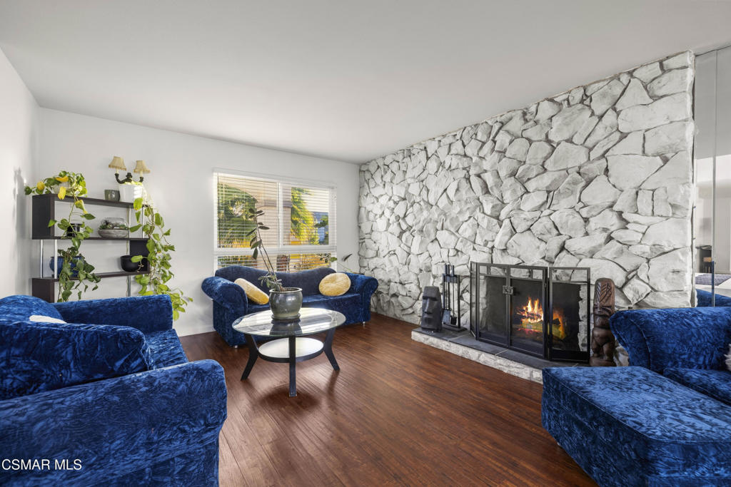 2371 Larch Street Simi Valley, CA 93065 - Photo 9 of 40 a living room with furniture and a fireplace