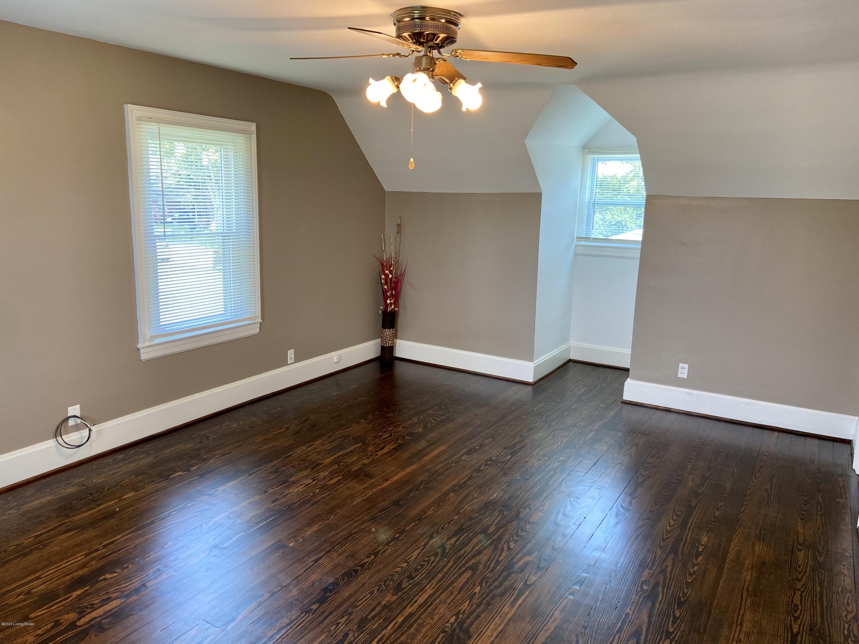 129 Spring Street New Castle, KY 40050 - Photo 28 of 53 Large master bedroom with NEW windows, NEW mini split, refinished hardwood floors