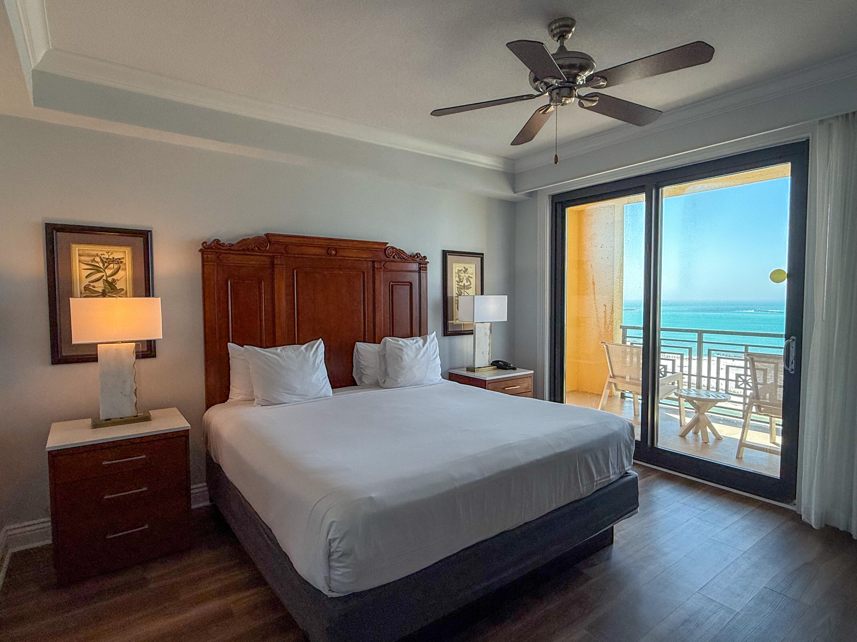 10 Harbor Boulevard, Unit E505F Destin, FL 32541 - Photo 12 of 25 a bedroom with a large bed and a window