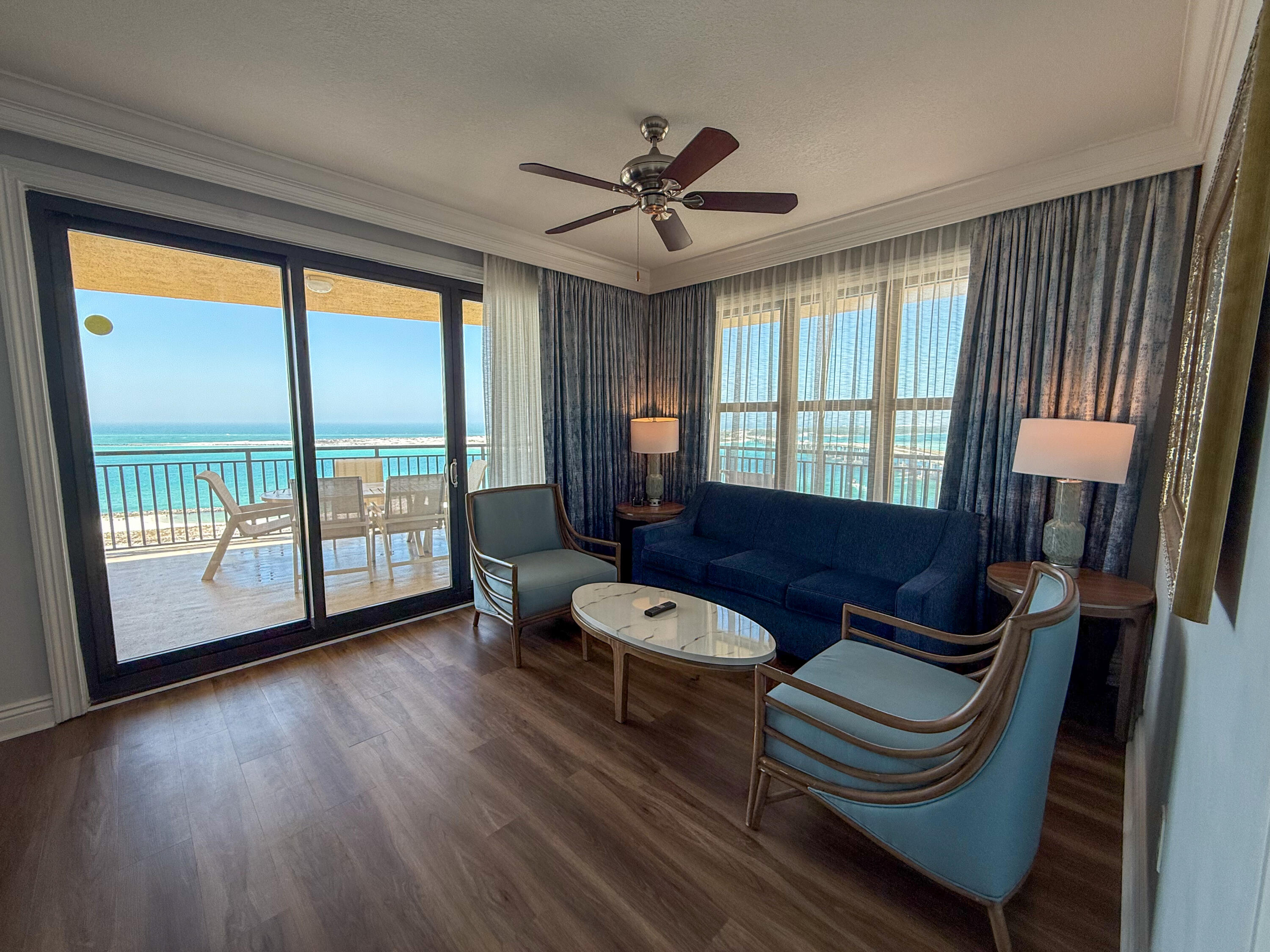 10 Harbor Boulevard, Unit E505F Destin, FL 32541 - Photo 6 of 25 a living room with furniture and a large window