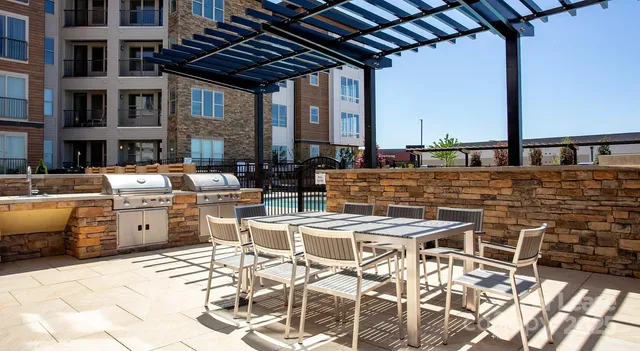 a dinning table and chairs in the patio