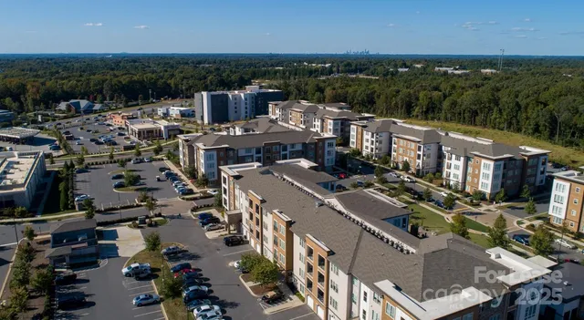 an aerial view of a city with lots of residential buildings