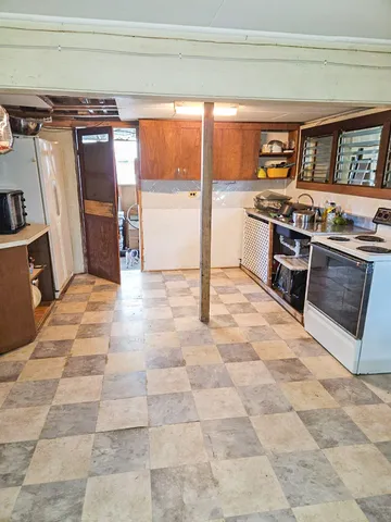a view of a kitchen with a sink